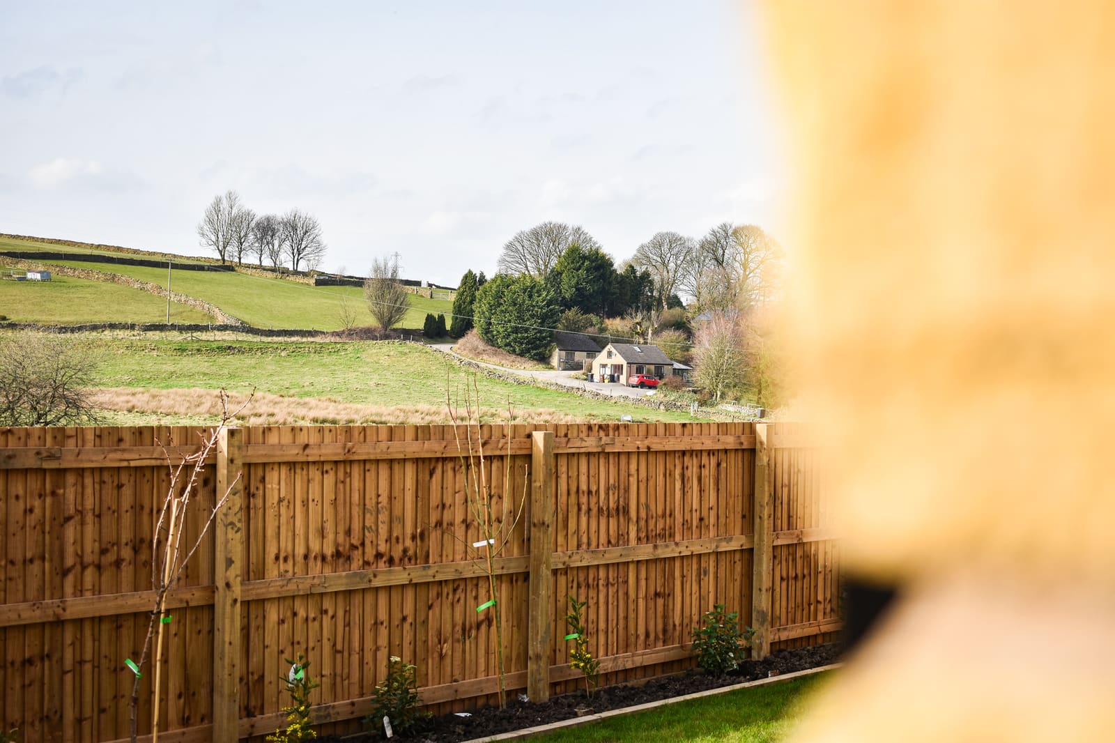 View from a garden gatepost across the valley